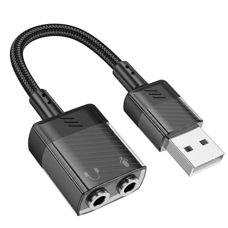 Ulkoinen äänikortti, jossa on USB ja kaksi 3,5 mm:n liitintä mikrofonille ja kuulokkeille